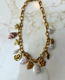 Large Charm Necklace with Pearls and Shell Shapes in Gold